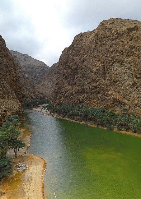 Emerald green waters of Wadi Shab in Oman