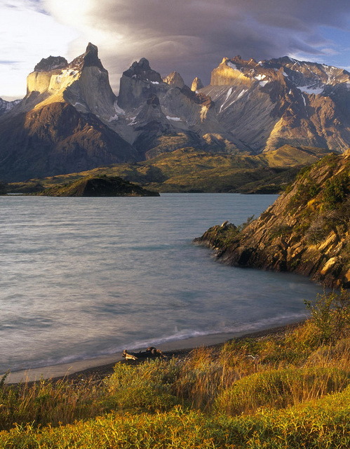 Lenticular clouds at sunset over the Cuernos del Paine from the shore of Lago Pehoe, Chile