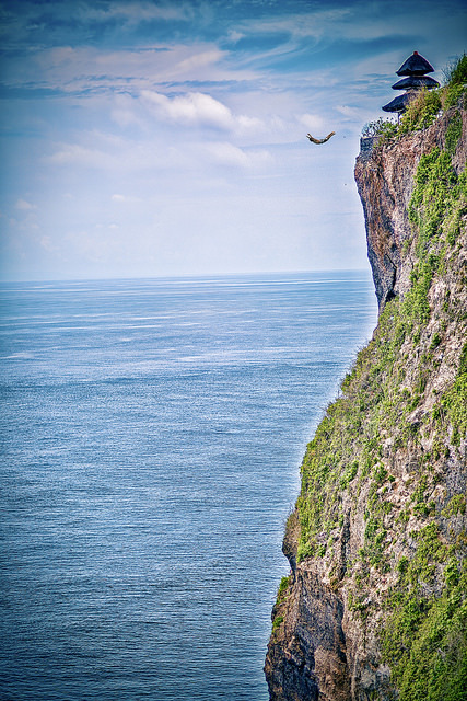 Cliff diving from Uluwatu Temple, Bali / Indonesia
